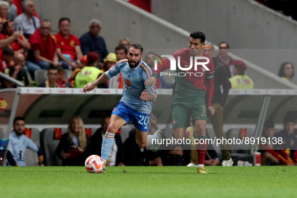 Dani Carvajal of Spain (L) vies with Cristiano Ronaldo of Portugal during the UEFA Nations League Group A2 football match between Portugal a...