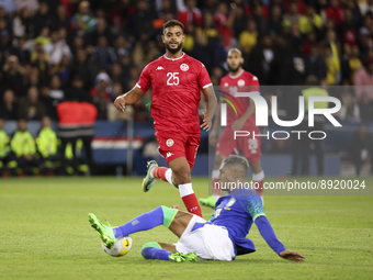 Anis Ben Slimane of Tunisia, Raphinha of Brazil (lying) during the International friendly game, football match between Brazil and Tunisia on...