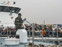 Arriving of a Tunisian guard coast boat carrying irregular migrants caught near the coast of Sfax. (