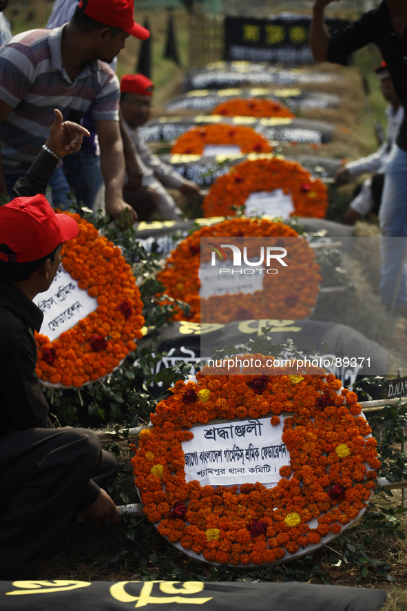  Bangladeshi activists and relatives of the victims of the Rana Plaza building collapse take part in a protest marking the first anniversary...