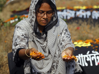 Relatives of the Savar Rana plaza tragedy victims visited grave yard of Rana Plaza victims to  remembrance 1st anniversery of Rana Plaza col...