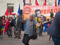 the people dance the Sirtaki music during the presentation of Italy's Tsipras List in Piazza Affari (Milan Stock Exchange) , on April 23, 20...