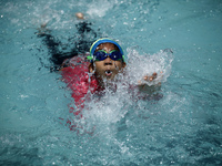 Children are learing swimming in a swimming pool at Dhaka.
Bangladesh is a rivering country,every 31 minutes a Bangladeshi child dies from d...