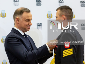 The President of the Republic of Poland, Andrzej Duda and the Minister of Defence, Mariusz Błaszczak decorate navy servicemen and women with...