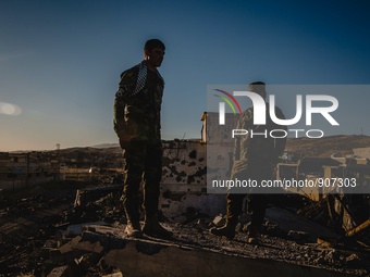 Iraqi autonomous Kurdish region's peshmerga forces inspect the liberated city of Sinjar, on November 14, 2015. Iraqi Kurdish leader Massud B...