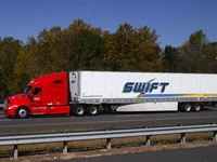 A truck with Swift logo semitrailer is seen at Interstate 95 highway in Maryland, United States, on October 21, 2022. (