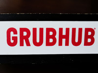 Grubhub logo sign is seen in a restaurant in Chicago, United States, on October 17, 2022. (