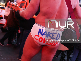 Robert John Burck, the Naked Cowboy, performs on Times Square in New York City, United States on October 22, 2022. (