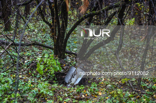 KHARKIV REGION, UKRAINE - OCTOBER 26, 2022 - The remains of a missile are stuck in the ground in a forest near Izium after the liberation of...