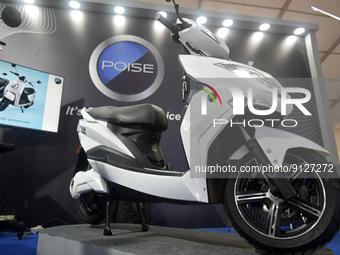 Poise an electric scooter company displays their range of EV Scooter at Global Investors Meet 2022 in Bangalore, India, 02 November, 2022....