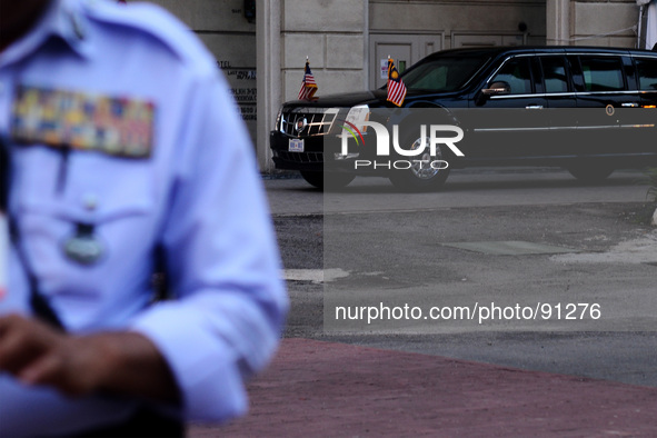 A Malaysian Police stands guard in front of the hotel where U.S. President Barack Obama is staying for the duration of his Malaysia visit in...