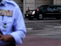 A Malaysian Police stands guard in front of the hotel where U.S. President Barack Obama is staying for the duration of his Malaysia visit in...