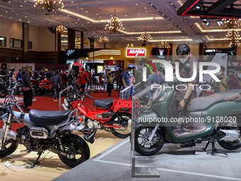 Visitors look at motorcycles during the Indonesia Motorcycle Show Exhibition in Jakarta, Indonesia, November 3, 2022. Indonesia is now makin...