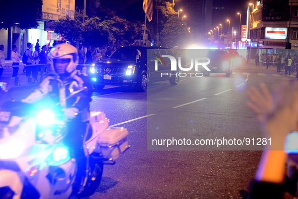 A Malaysian Police escorts U.S. President Barack Obama motorcade during his Malaysia visit in Kuala Lumpur, Malaysia, Saturday, April 26, 20...