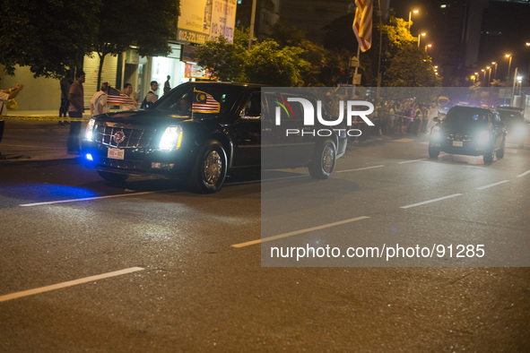 President Barack Obama's motorcade drives pass during his Malaysia visit in Kuala Lumpur, Malaysia, Saturday, April 26, 2014.