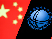 State Grid Corporation Of China logo displayed on a phone screen and Chinese flag displayed on a screen in the background are seen in this i...