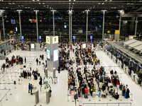 Travels seen inside the departure terminal of the Suvarnabhumi International Airport on November 9, 2022 in Sumut Prakan, Thailand. (