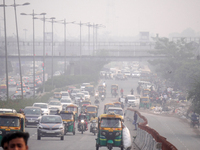 Traffic moves along a road shrouded amidst a dense layer of smog and haze in New Delhi, India on November 6, 2022. In the subsequent days, t...