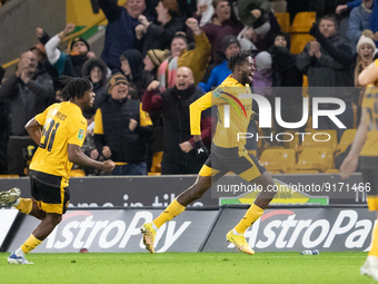 Boubacar Traore of Wolves (R) celebrates scoring their side's first goal of the game during the Carabao Cup match between Wolverhampton Wand...