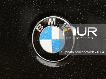 BMW emblem is seen on the car in Krakow, Poland on November 10, 2022. (