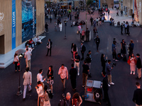 Participants walk in the open area on the fourth day of the COP27 UN Climate Change Conference, held by UNFCCC in Sharm El-Sheikh Internatio...