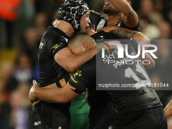 Dylan Brown  celebrates with his team mates after scoring New Zealand's 2nd try during The 2021 Rugby League World Cup Semi Final between Au...