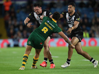 Jordan Rapana  of New Zealand stops Latrell Mitchell of Australia dead in his tracks during The 2021 Rugby League World Cup Semi Final betwe...