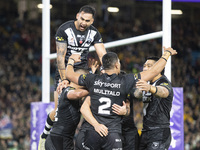 New Zealand Five-Eighth Dylan Brown celebrates with his team mates after scoring a try during the 2021 Rugby League World Cup Semi Final mat...