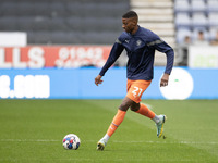Marvin Ekpiteta (21)of Blackpool FC warms up during the Sky Bet Championship match between Wigan Athletic and Blackpool at the DW Stadium, W...