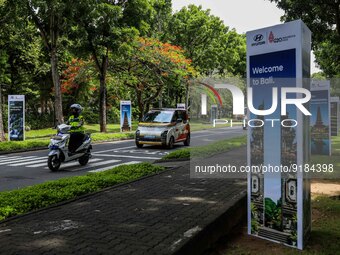 An electric taxi passed ahead of the G20 Summit in Nusa Dua, Bali, Indonesia, Saturday, Nov. 12, 2022. Indonesia will host the 17th G20 Summ...