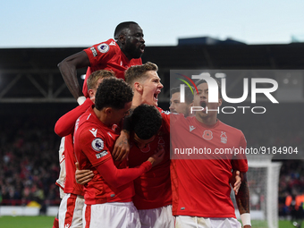 The Reds celebrate after Morgan Gibbs-White of Nottingham Forest scored a goal to make it 1-0 during the Premier League match between Nottin...