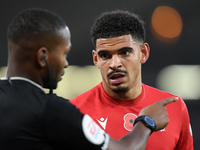 Morgan Gibbs-White of Nottingham Forest approaches the assistant referee after ruling for off-side during the Premier League match between N...