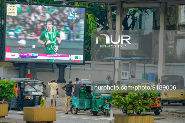Sri Lankan cricket fans watching the T20 final between Pakistan and England through a large screen at a fuel station in Colombo, Sri Lanka o...