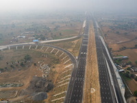 A drone shot of under-construction  access-controlled expressway connecting India's national capital New Delhi with its financial capital Mu...