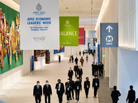 People walk inside the Queen Sirikit National Convention Center where the APEC Summit 2022 during the APEC 2022 Economic Leader’s Week at Qu...