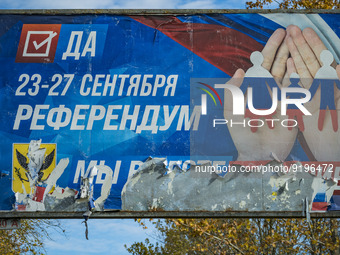 Huge banner in support of the so called referendum for the russian annexation of the Kherson province during the occupation by the the russi...