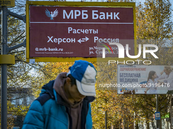 Banner of a russian bank in Kherson city center posted during the occupation by the the russian army of the city. After hard combats, the ci...