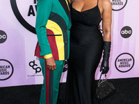 Jessica Betts and wife Niecy Nash Betts arrive at the 2022 American Music Awards (50th Annual American Music Awards) held at Microsoft Theat...