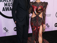 Eric Winter and Roselyn Sánchez (Roselyn Sanchez) arrive at the 2022 American Music Awards (50th Annual American Music Awards) held at Micro...