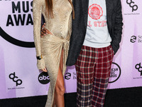 Joan Smalls and Brent Faiyaz arrive at the 2022 American Music Awards (50th Annual American Music Awards) held at Microsoft Theater at L.A....