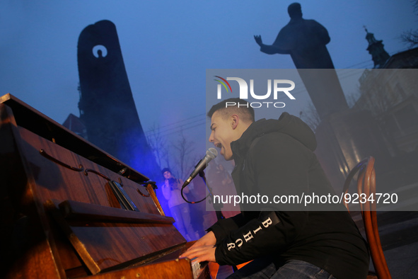 LVIV, UKRAINE - NOVEMBER 21, 2022 - Ukrainian singer Shumei performs Maidan and present-day songs during the Maidan Reminiscences art event...