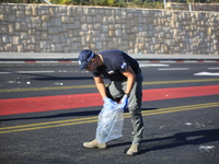 Israeli police inspect the scene of an explosion at a bus stop in Jerusalem, Wednesday, Nov. 23, 2022. Two blasts have gone off near bus sto...
