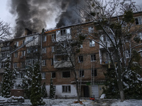 Rescuers work at a site of a residential building destroyed by a Russian missile attack in the  Vyshhorod town, near Kyiv, Ukraine, November...