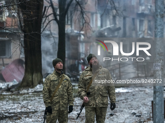 Ukrainian servicemen at a site of a residential building destroyed by a Russian missile attack in the  Vyshhorod town, near Kyiv, Ukraine, N...