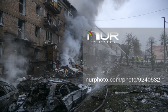 Rescuers work at a site of a residential building destroyed by a Russian missile attack in the Vyshhorod town, near Kyiv, Ukraine, November...