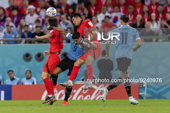 Jaesung Lee , Luis Suarez , Minjae Kim , Darwin Nunez  during the World Cup match between Uruguay v Korea Republic in Doha, Qatar, on Novemb...