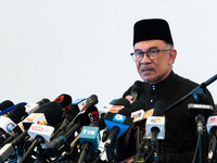 Malaysia's new Prime Minister, Anwar Ibrahim, speaks during his first press conference on November 24, 2022, at Kajang, Malaysia. He was nam...