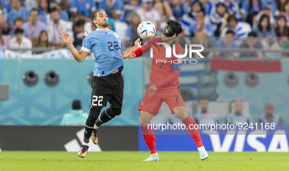 Martin Caceres , Heungmin Son  during the World Cup match between Uruguay v Korea Republic in Doha, Qatar, on November 24, 2022. 
