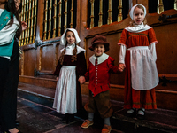 Children dressing like pilgrims are posing, before Thanksgiving Day Service began in Leiden, on November 2022. (
