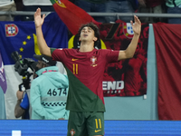 Joao Felix Second Striker of Portugal and Atletico de Madrid celebrates after scoring his sides first goal during the FIFA World Cup Qatar 2...